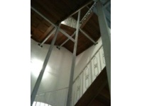 Unterkonstruktion für Aufzug in denkmalgeschütztem Bestand mit gleichzeitiger Abfangung der alten Holztreppe