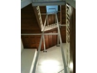 Unterkonstruktion für Aufzug in denkmalgeschütztem Bestand mit gleichzeitiger Abfangung der alten Holztreppe
